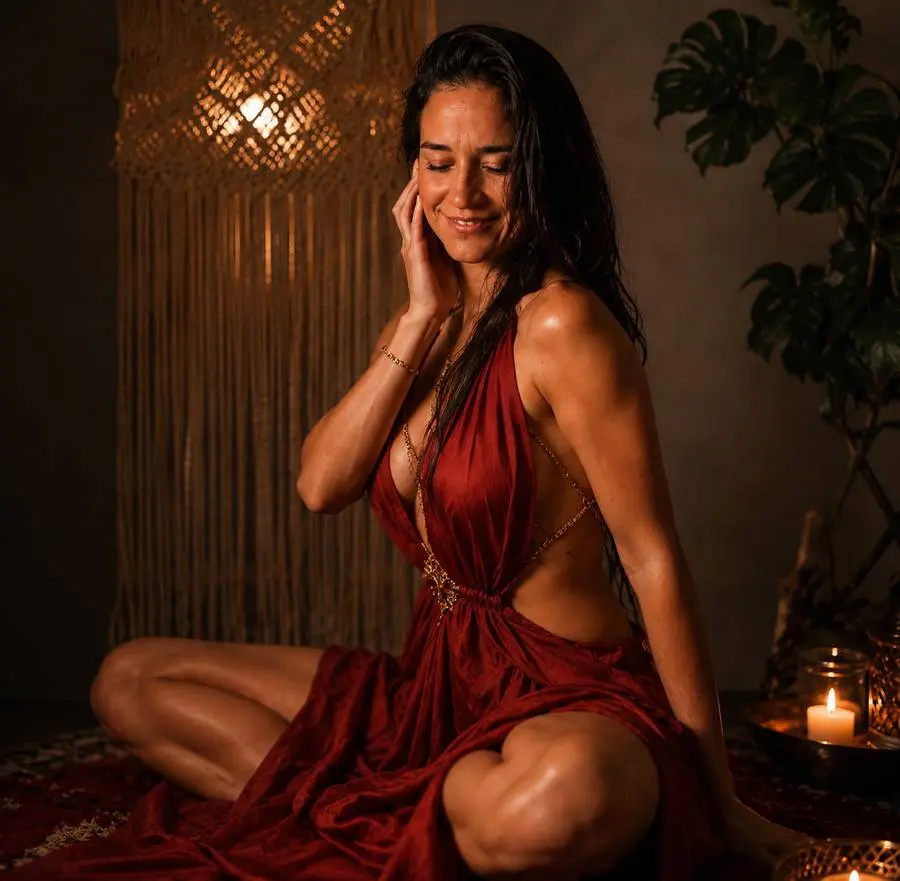 May Gonzalez holding a candle